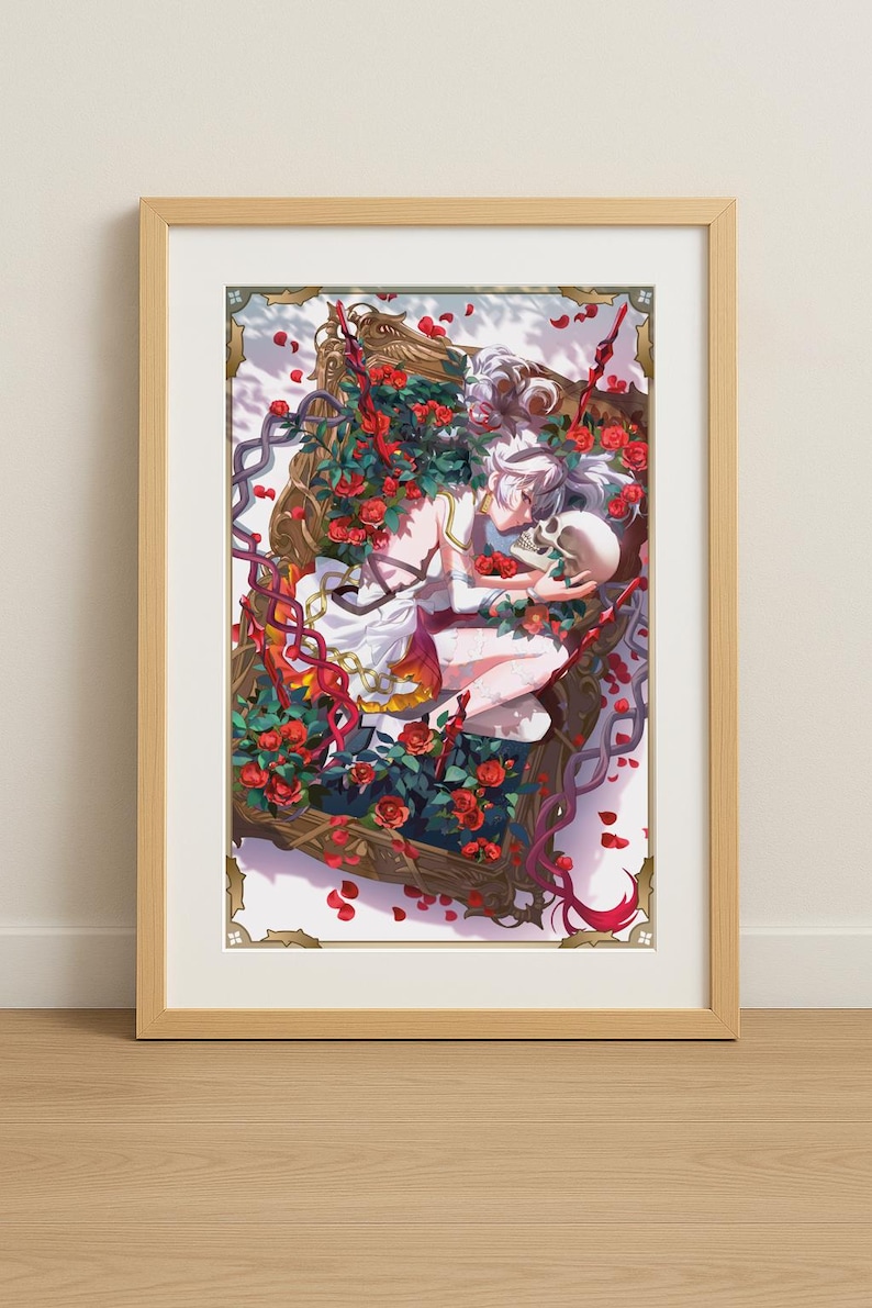 May include: A framed illustration of a woman with white hair lying in a coffin surrounded by red roses. The woman is holding a skull in her arms. The coffin is decorated with chains and vines.