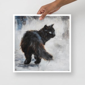 May include: A black cat with green eyes is walking away from the viewer. The cat is in focus, while the background is a blurry, light gray.