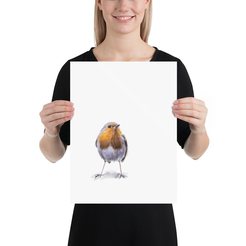 May include: A watercolor painting of a robin bird with a red breast, gray wings, and a yellow beak. The bird is standing on a white background.