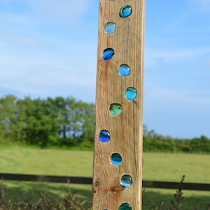 12 hole Sun-catcher in blues and greens reclaimed pallet wood