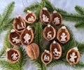 Real walnut shells with fretwork tree branch pendant