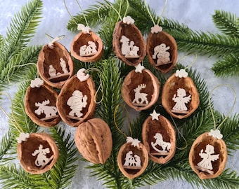 Real walnut shells with fretwork tree branch pendant