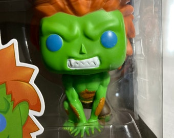 Why is Blanka from 'Street Fighter II' green? 30 years later it's still a  mystery