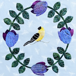 May include: A yellow bird with black wings sits on a branch of green leaves with purple and blue flowers. The background is a light blue with white bees.