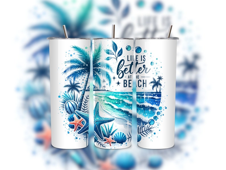 May include: White tumbler with a blue and green beach scene and the text "Life is better at the beach".