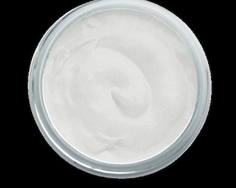 May include: A white cream in a clear glass jar with a lid.