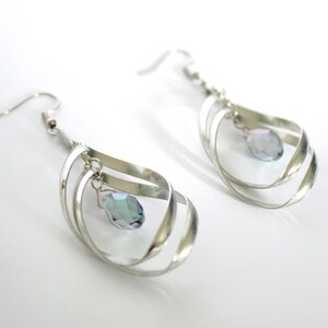 Crystal Tango, Silver w/ Blue Crystal, spinner earrings, 360 spinner earrings, drop earring, spinner earring, twist, spiral, leaf, tear drop
