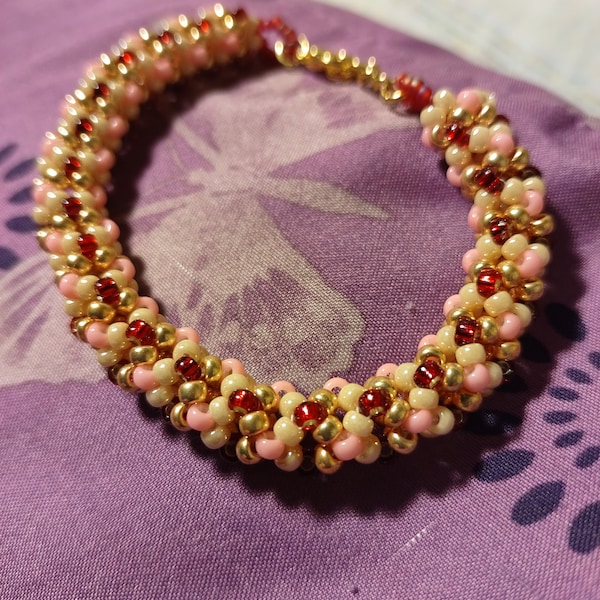 7inch Pink/Red Netted Stitch, Beaded Bangle style, Bracelet, W/Gold 1inch Extender, Lobster Claw clasp