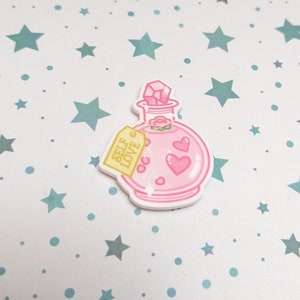 May include: A pink, cartoon-style potion bottle with a crystal stopper and two pink hearts. A yellow tag reads "SELF LOVE". The bottle has a white outline and is set against a background of blue stars.