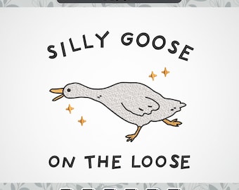 May include: Machine embroidery design featuring a whimsical illustration of a goose with the text "SILLY GOOSE ON THE LOOSE". The goose is gray with a yellow beak and feet, and there are yellow star accents.