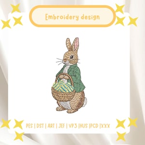 May include: An embroidered design featuring a brown rabbit wearing a green jacket and holding a woven basket filled with colorful eggs. The text "Embroidery design" is displayed above the rabbit. Yellow star accents surround the image.