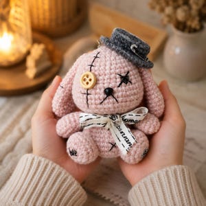 Crochet patchwork bunny plush, pink stitched rabbit with button eye and gray hat, cute handmade amigurumi doll, gothic nursery decor gift