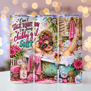 May include: A cylindrical tumbler featuring a graphic of a person in a bathtub with bubbles, pink flowers, and a candle. The text reads: Can't TALK RIGHT NOW I'm doing chubby girl SHIT, and Bubbles Relax Unwind Repeat. The design includes leopard print accents.