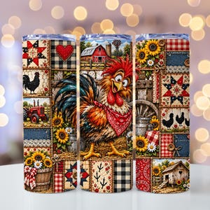 May include: A cylindrical tumbler featuring a patchwork design of farm-themed illustrations including a rooster wearing a red bandana, a red barn, sunflowers, a red tractor, chickens, and quilt patterns in red, white, blue, and black colours.