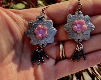 Black and pink floral polymer clay dangle earrings with duo chrome beads