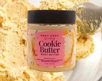 May include: A 4 ounce jar of cookie butter body butter with a pink and white label that says "Rosy Posy Skin & Beauty Cookie Butter Body Butter" and lists the ingredients as shea butter, cocoa butter, coconut oil, and scented essential oil.