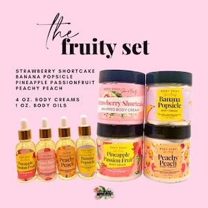 May include: A set of four 4-ounce body creams and four 1-ounce body oils in a pink and white color scheme. The body creams are labeled "Strawberry Shortcake", "Banana Popsicle", "Pineapple Passion Fruit", and "Peachy Peach". The body oils are labeled "Pineapple Passion Fruit", "Strawberry Shortcake", "Peachy Peach", and "Banana Popsicle".