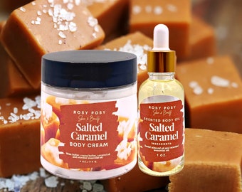 May include: A jar of Salted Caramel Body Cream and a bottle of Scented Body Oil from Rosy Posy. The body cream is 4 oz. and the oil is 1 oz. Both products have a brown label with the product name. Caramel squares with salt crystals are in the background.