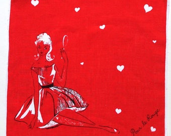 Ragazza con fazzoletto e rossetto anni '60 in abito sottoveste con specchio