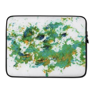 Peut inclure: Housse d'ordinateur portable abstraite avec un fond blanc et un motif de peinture éclaboussée vert, bleu et or.