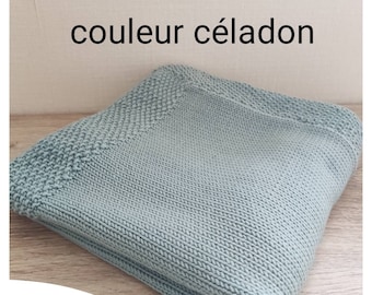 Hand-knitted merino wool baby blanket in jersey and moss stitch