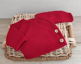 Newborn wrap baby bra, hand-knitted layette in red merino wool and wooden buttons