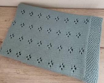 Hand-knitted merino wool baby blanket