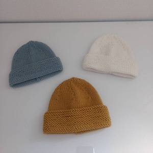Baby hat with garter stitch cuff hand knitted in merino wool