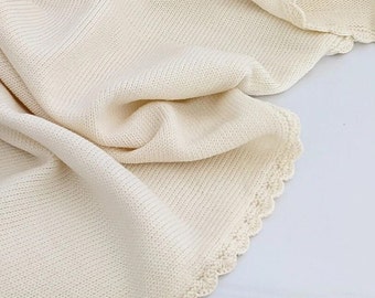 Hand-knitted merino wool baby blanket