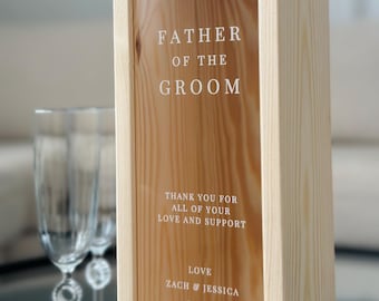 May include: A wooden box with a clear glass window, featuring the text "Father of the Groom". The box also includes a message of thanks for love and support, with the names Zach & Jessica and the date 3.1.2025.