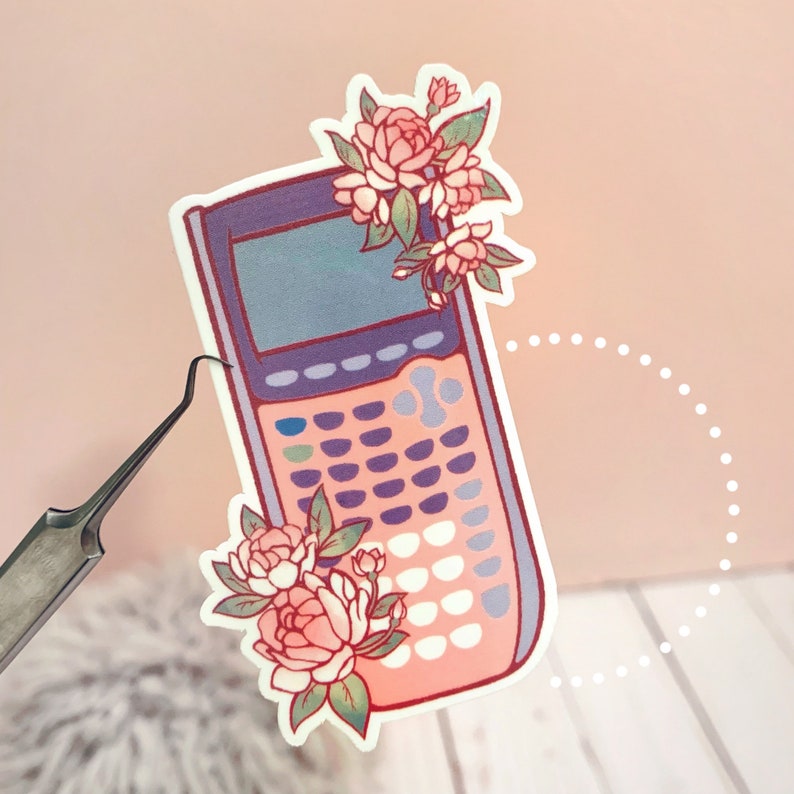May include: A pink and purple calculator sticker with a floral design. The calculator has a screen, buttons, and a pink and purple color scheme. The flowers are pink and white with green leaves.