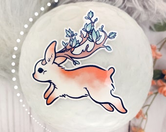 Naklejka z różowym króliczkiem Jackalope: wodoodporna naklejka z kwiatowym królikiem