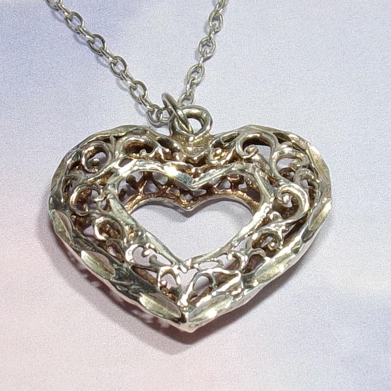 Sterling Silver Scrollwork Open Center Puffed Hea… - image 1
