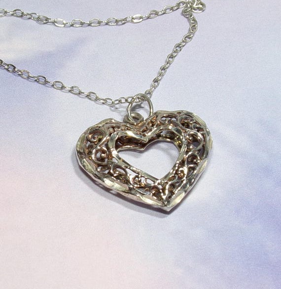 Sterling Silver Scrollwork Open Center Puffed Hea… - image 2