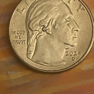 2024 error coin Washington quarter double die obverse “in cod we trust” . Reverse image stamped  on reverse. Many errors!