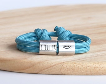 Personalized communion bracelet with fish design, hand-stamped and engraved, for baptism or confirmation.
