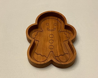 Plato de dulces de madera dura con forma de hombre de jengibre