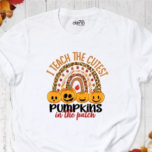 Halloween Teacher Shirt, Fall Teacher Shirt, I Teach The Cutest Pumpkins In The Patch Pumpkins Shirt, Rainbow Pumpkin School Teacher Shirt