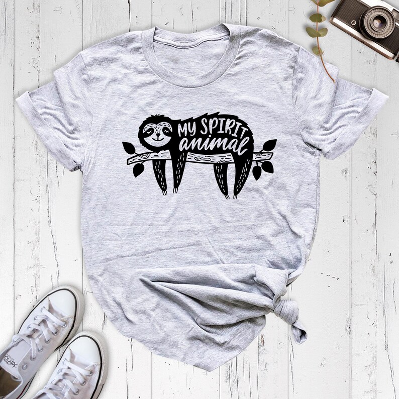 May include: Gray t-shirt with a black sloth graphic and the text "My spirit animal".