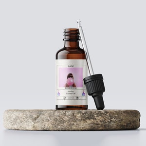 May include: A brown glass bottle with a dropper, labelled "BADE BUBBLE GUM", featuring a pink bubble gum and a girl blowing a bubble. The label also says "Inspire Essential Oil 100% Pure"
