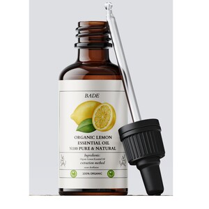 Könnte beinhalten: Eine braune Glasflasche mit einer Pipette, gefüllt mit Bio-Zitronen-Ätherischem Öl. Das Etikett lautet "BADE Bio-Zitronen-Ätherisches Öl 100% rein & natürlich" und enthält die Zutaten, die Extraktionsmethode und eine 100% Bio-Zertifizierung.