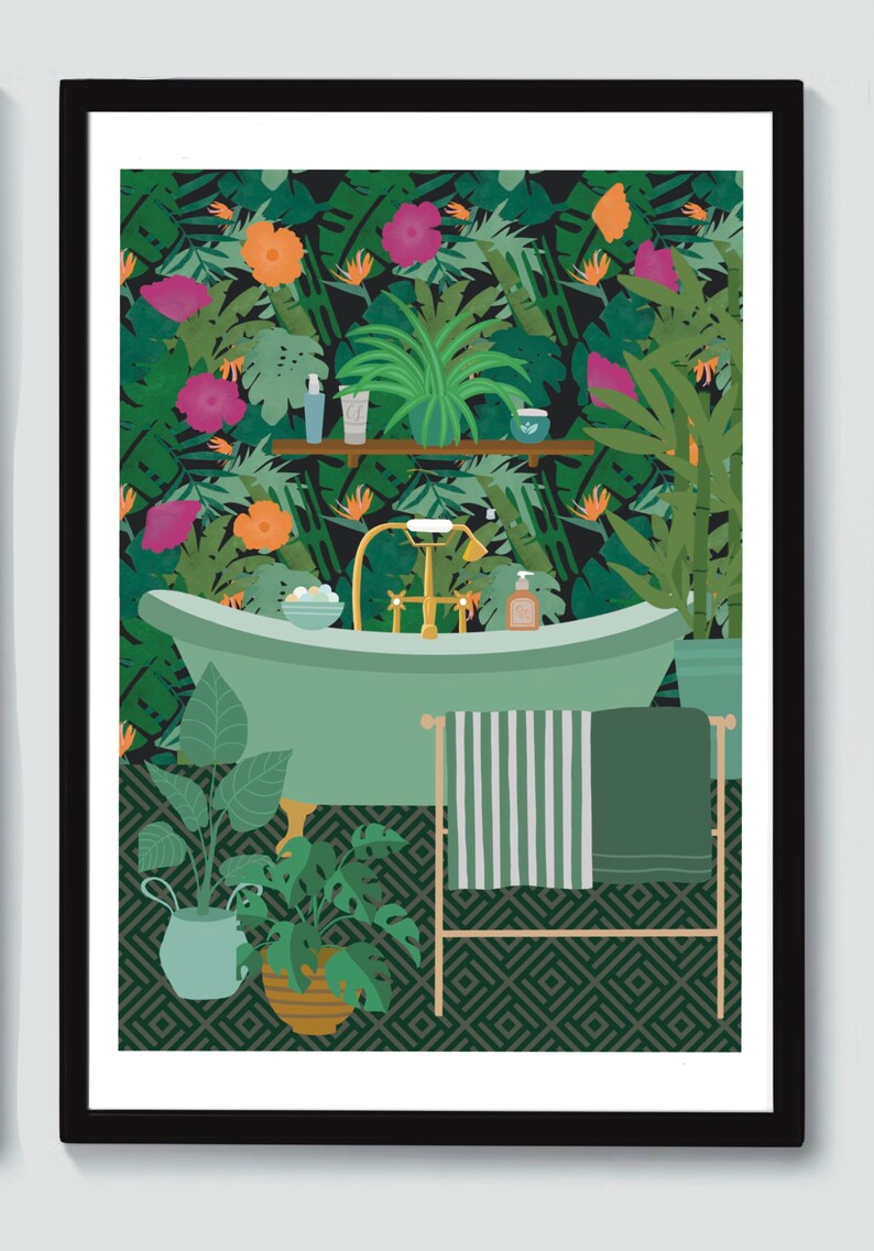 May include: A green bathtub with gold fixtures sits in a bathroom with a tropical wallpaper design. The bathroom has a towel rack with a green striped towel and a green towel. There are plants in pots on the floor.