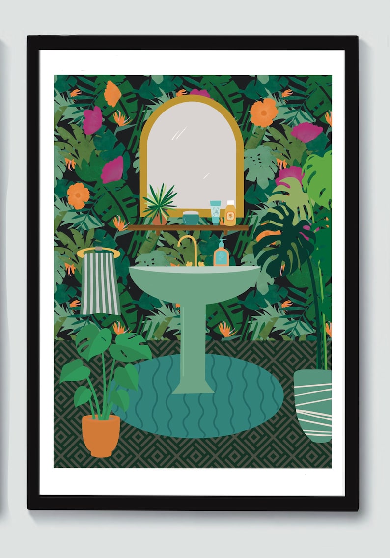 May include: A green bathroom sink with a gold faucet and a mirror above it. The sink is surrounded by tropical plants and flowers. The floor is covered in a geometric pattern.