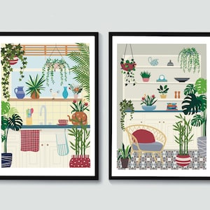May include: Two framed illustrations of kitchens with a variety of plants and greenery. The first image shows a kitchen sink with a red and white checkered dish towel. The second image shows a kitchen with a wicker chair and a patterned tile floor.