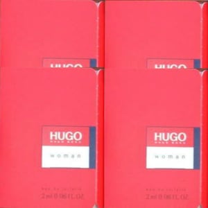 May include: Four red boxes with the Hugo Boss logo and the words "Hugo Boss Woman" printed on them. Each box contains a 2 ml (0.067 fl oz) bottle of perfume.
