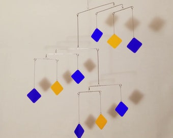 Diamonds hanging mobile kinetic art sculpture 22"W x 23"H. Different color combinations are available.
