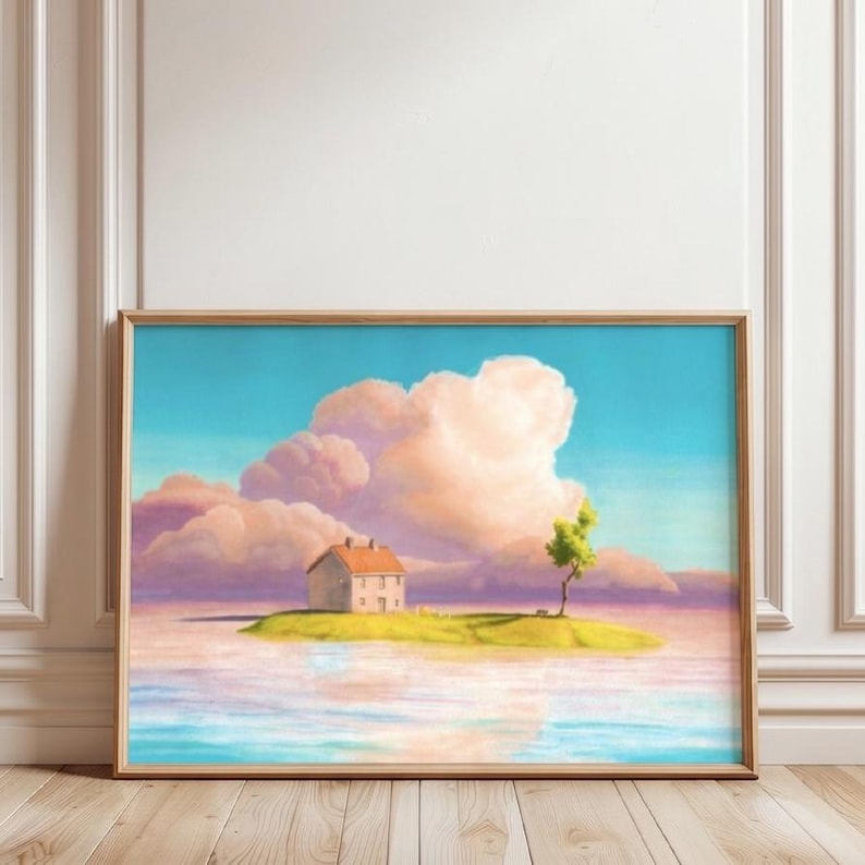 May include: A framed art print showing a tranquil scene. A small house with a red roof is on a grassy island, with a tree. The sky is a gradient of blue and pink, with fluffy clouds. The water reflects the sky and island.