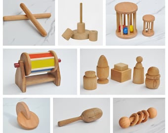 Doos met Montessori houten speelgoed, Montessori rollende rammelaar, Montessori in elkaar grijpende schijf, draaiende trommel, ei in beker, Maracas