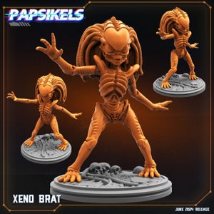 May include: Orange-tan Xeno Brat figurine with a detailed skeletal structure and elongated head, posed on a grey circular base. The figurine has multiple arms and a detailed head. The text "XENO BRAT" is at the bottom, with "JUNE 2024 RELEASE" at the bottom right.