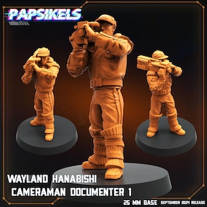 May include: Three 3D printed miniature figures of people wearing jackets and hats. The figures are holding cameras and weapons. The figures are standing on circular bases. The text "Wayland Hanabishi Cameraman Documenter 1 25 MM Base September 2024 Release" is at the bottom of the image.